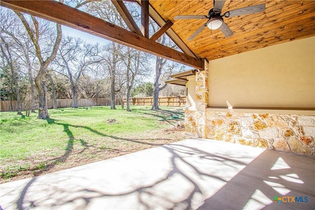 view of patio / terrace featuring a ceiling fan and fence