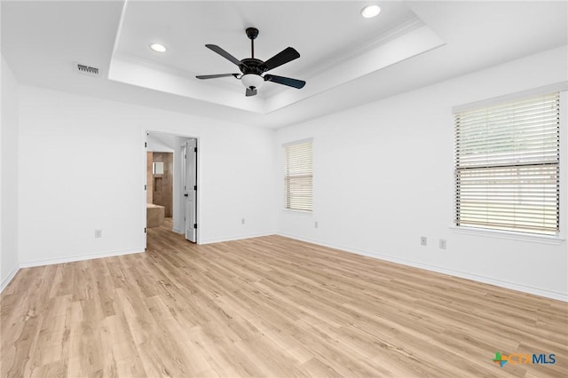 1010 Woodland Bend Cir, Salado, TX 76571 - unfurnished room featuring a raised ceiling, light wood-style floors, recessed lighting, and ceiling fan