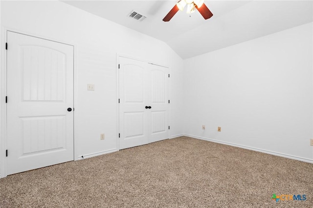 1010 Woodland Bend Cir, Salado, TX 76571 - unfurnished bedroom with vaulted ceiling, carpet, a ceiling fan, and a closet