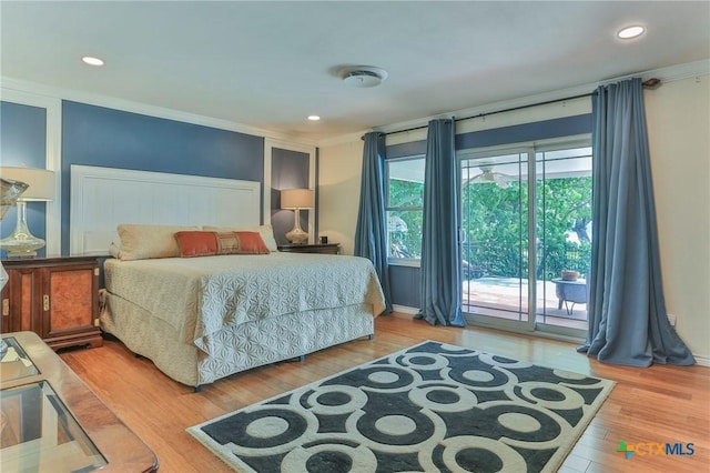 522 Woodland Point Rd, Belton, TX 76513 - bedroom with recessed lighting, baseboards, access to exterior, and wood finished floors
