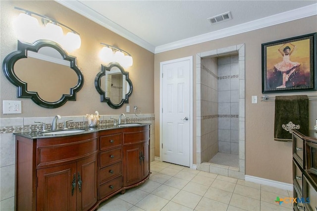 522 Woodland Point Rd, Belton, TX 76513 - full bathroom featuring visible vents, ornamental molding, tile patterned floors, a sink, and a tile shower