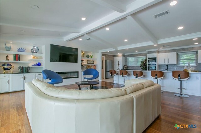 522 Woodland Point Rd, Belton, TX 76513 - living room with recessed lighting, vaulted ceiling with beams, light wood-type flooring, and visible vents