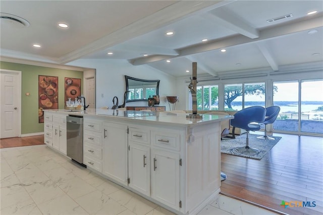 522 Woodland Point Rd, Belton, TX 76513 - kitchen with white cabinets, a sink, dishwasher, recessed lighting, and visible vents