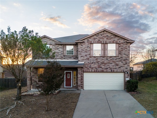 front of property featuring a garage