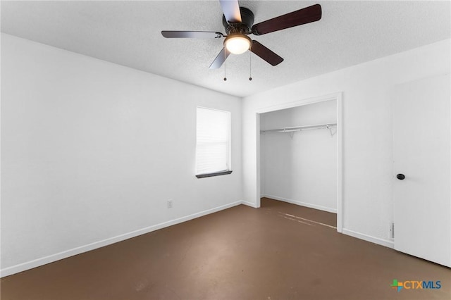 unfurnished bedroom with ceiling fan, a closet, and a textured ceiling