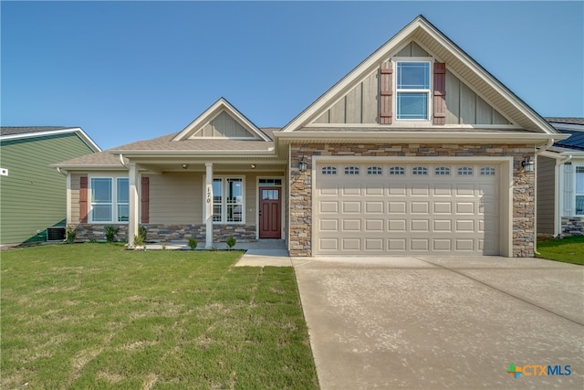 craftsman-style house with board and batten siding, stone siding, and covered porch