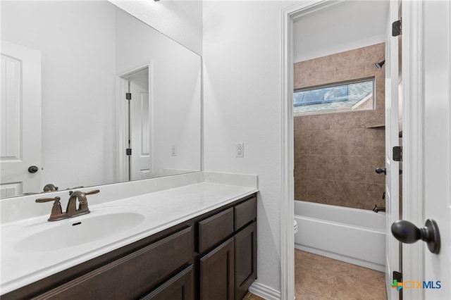 full bath featuring  shower combination, vanity, and toilet