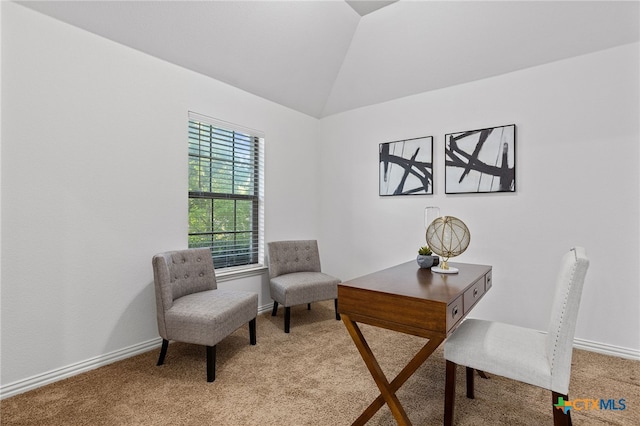 office featuring light colored carpet, baseboards, and lofted ceiling