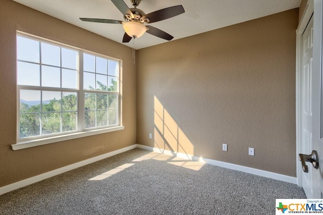 3037 Rustler, Canyon Lake, TX 78133 - unfurnished room featuring carpet floors, a ceiling fan, and a textured wall