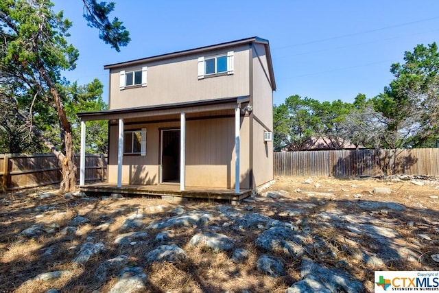 3037 Rustler, Canyon Lake, TX 78133 - back of property featuring a fenced backyard