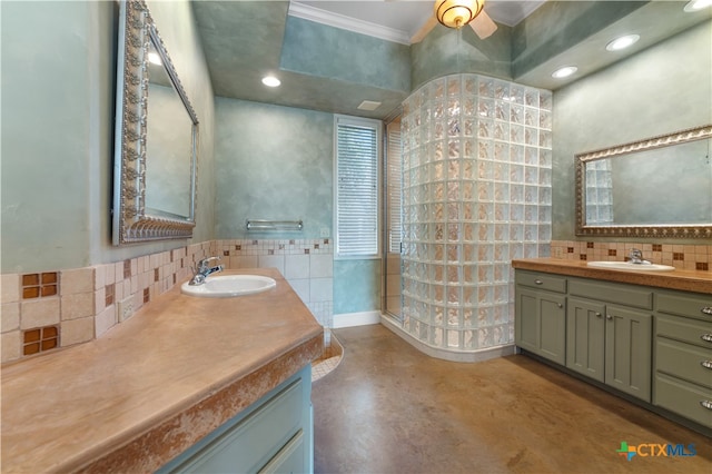 bathroom with concrete flooring, ceiling fan, vanity, and tile walls