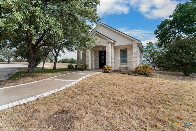 6529 Mountain View Dr, Killeen, TX 76549 - view of front of property with stone siding and a front lawn