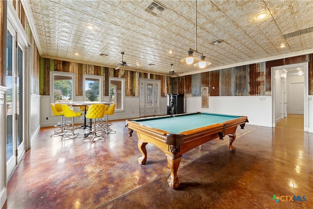 rec room with pool table, concrete floors, ceiling fan, and crown molding