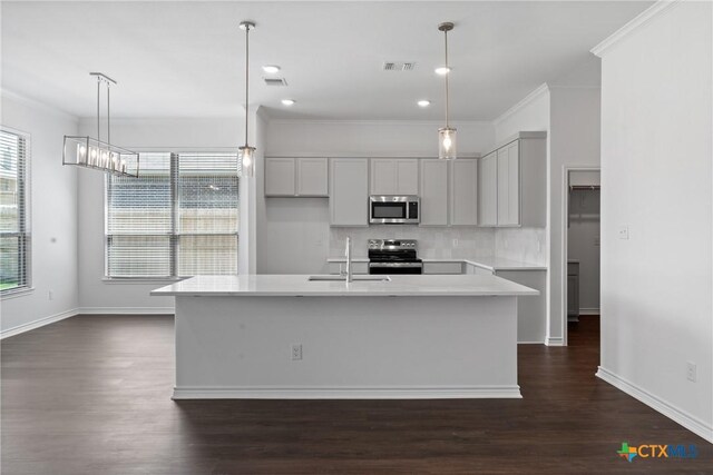 7912 Emery Oaks Dr, Temple, TX 76502 - kitchen with a sink, stainless steel appliances, dark wood-type flooring, and visible vents