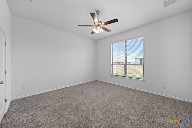 7912 Emery Oaks Dr, Temple, TX 76502 - carpeted empty room featuring visible vents, baseboards, and a ceiling fan