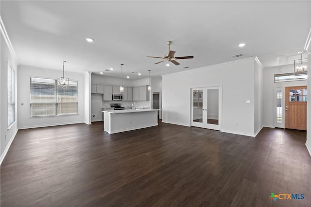 7912 Emery Oaks Dr, Temple, TX 76502 - unfurnished living room with baseboards, a ceiling fan, a sink, and recessed lighting