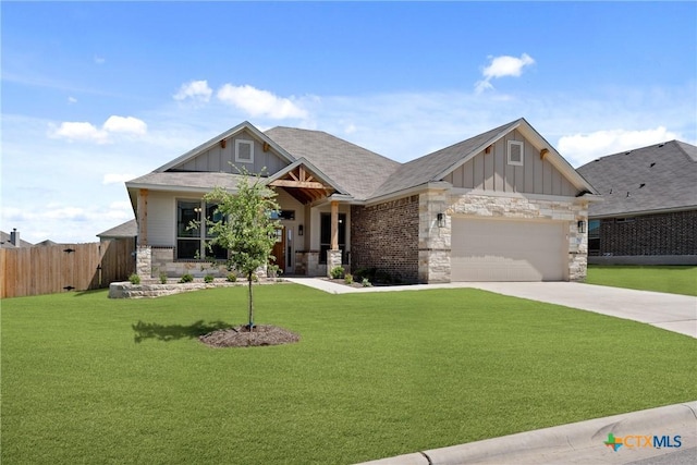 7912 Emery Oaks Dr, Temple, TX 76502 - craftsman inspired home featuring stone siding, a garage, fence, a front lawn, and board and batten siding