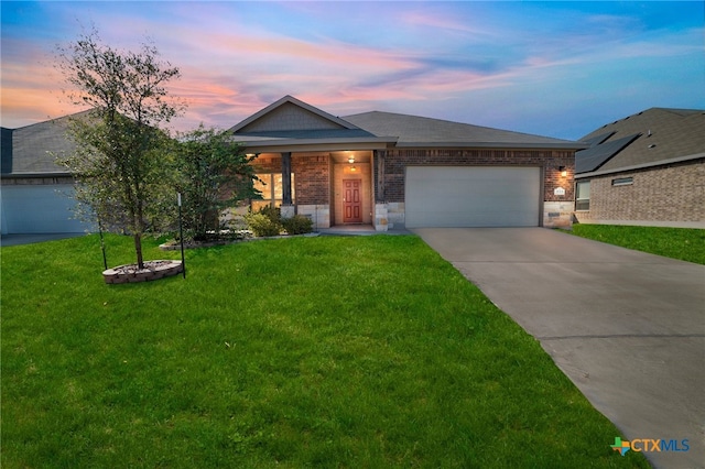 1444 Rolling Brook Dr, Temple, TX 76502 - ranch-style house with brick siding, driveway, an attached garage, and a front lawn