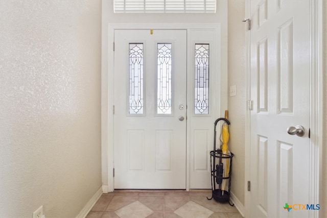 view of tiled foyer entrance