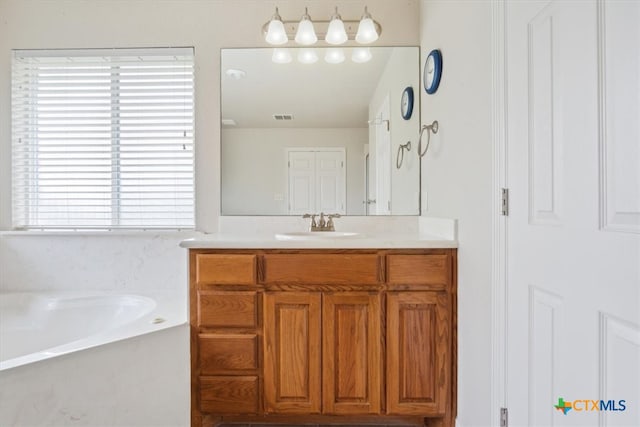 bathroom featuring a bathtub and vanity