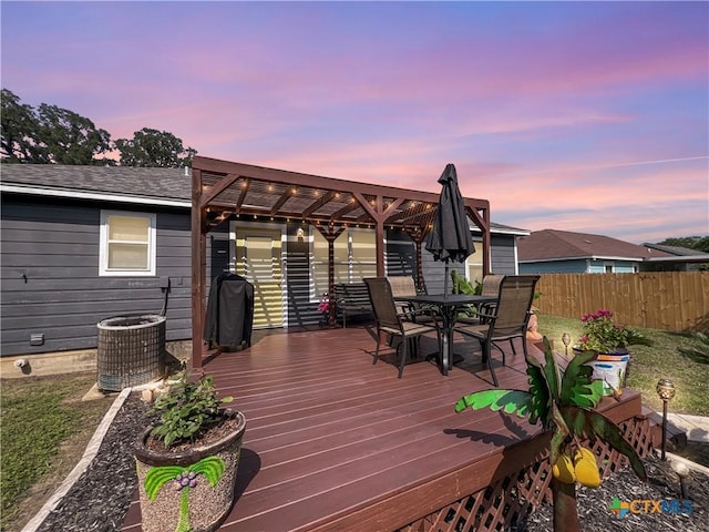 701 Clark St, Gonzales, TX 78629 - deck with central air condition unit and outdoor dining space