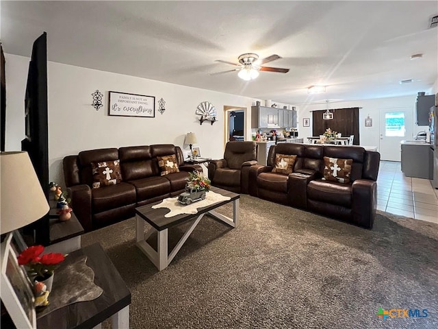 701 Clark St, Gonzales, TX 78629 - tiled living area with a ceiling fan