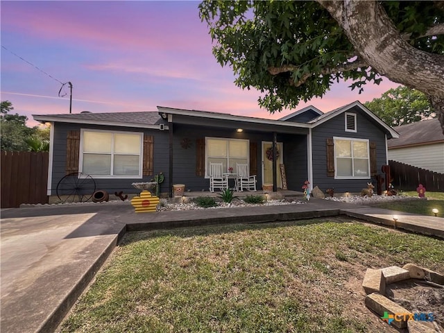 701 Clark St, Gonzales, TX 78629 - ranch-style house with covered porch