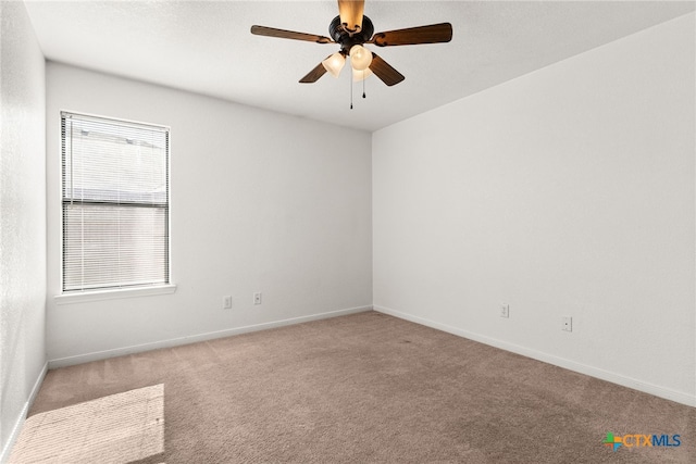 empty room with light carpet and ceiling fan