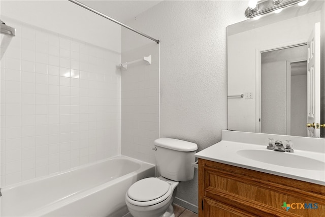 full bathroom featuring toilet, vanity, and shower / washtub combination