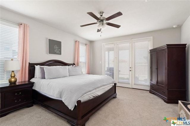 carpeted bedroom with access to outside and ceiling fan