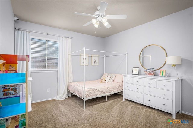 bedroom featuring baseboards, a ceiling fan, and carpet floors