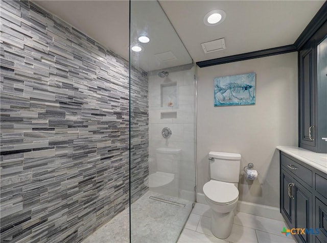 6021 State Highway 361 Unit 109, Port Aransas, TX 78373 - full bathroom with tile patterned floors, toilet, a walk in shower, vanity, and baseboards