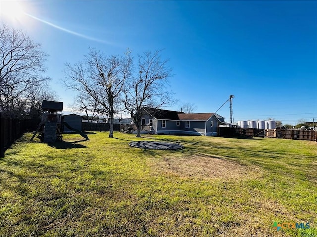 view of yard with a playground