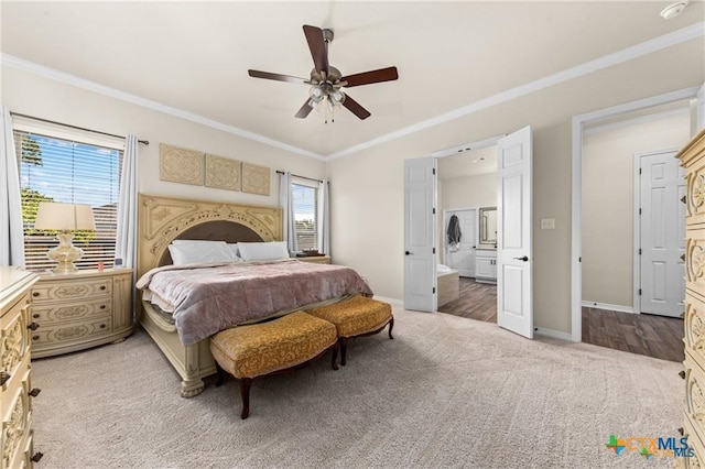 2755 Bowles Ranch Rd, Belton, TX 76513 - bedroom with light colored carpet, ornamental molding, baseboards, ensuite bathroom, and a ceiling fan