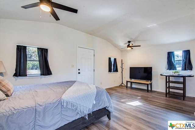 bedroom with hardwood / wood-style floors, ceiling fan, and lofted ceiling