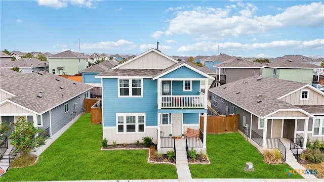 view of front of home with a front lawn