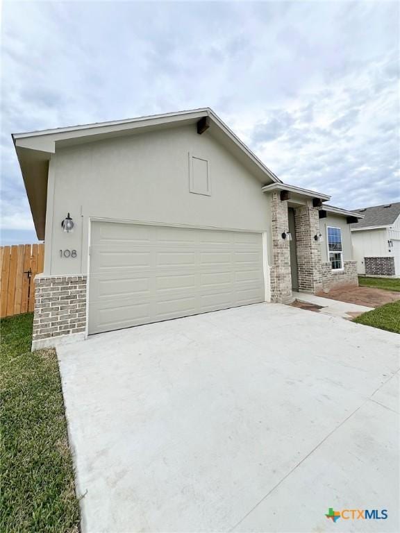 ranch-style home with a garage