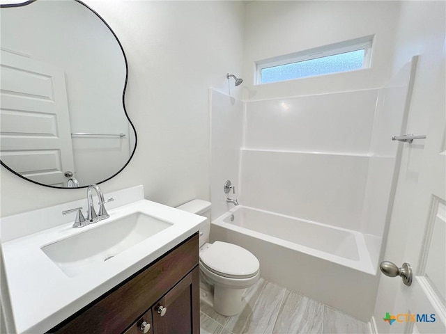 full bathroom featuring vanity, toilet, and bathing tub / shower combination