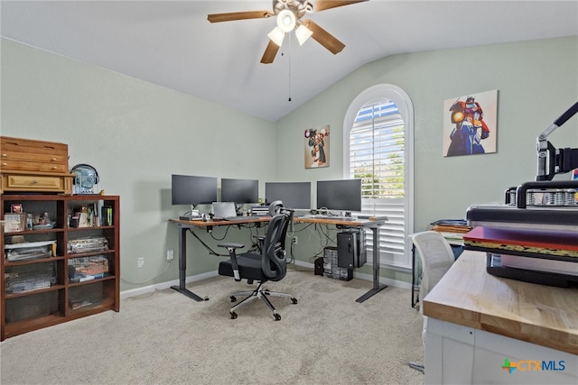 office space with lofted ceiling, light carpet, and ceiling fan