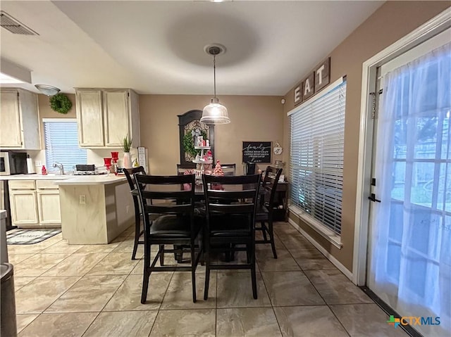 dining room with light tile patterned floors