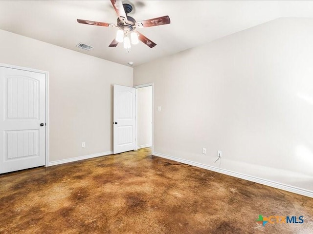 unfurnished bedroom featuring baseboards, concrete floors, ceiling fan, and visible vents