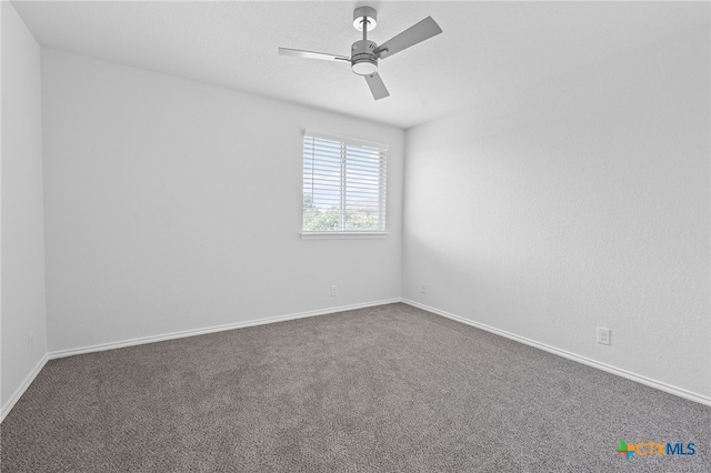 2534 Duval Dr, New Braunfels, TX 78130 - carpeted spare room featuring a ceiling fan and baseboards