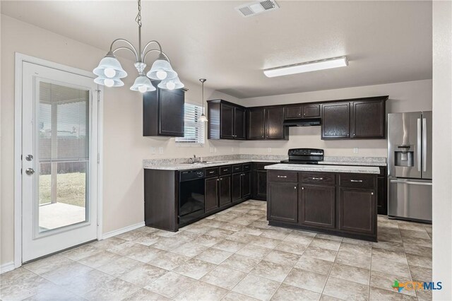 2205 Bald Eagle Ct, Killeen, TX 76549 - kitchen with black appliances, light countertops, under cabinet range hood, and a chandelier