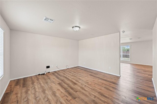 2205 Bald Eagle Ct, Killeen, TX 76549 - empty room featuring wood finished floors and baseboards