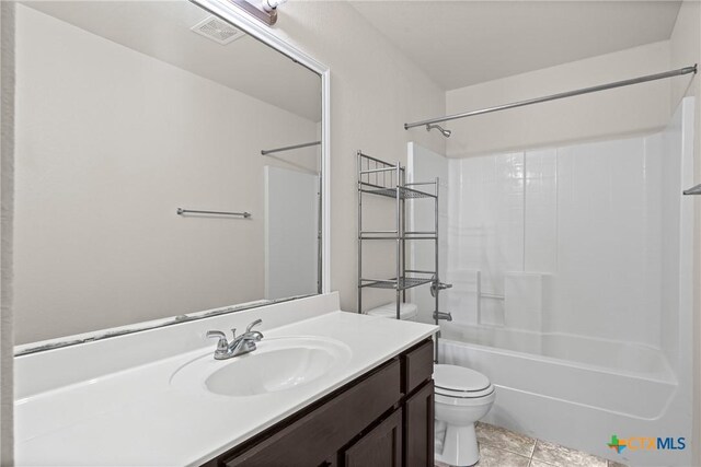 2205 Bald Eagle Ct, Killeen, TX 76549 - bathroom featuring vanity, tub / shower combination, and tile patterned floors