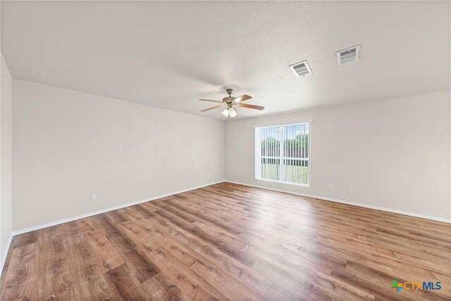 2205 Bald Eagle Ct, Killeen, TX 76549 - unfurnished room with a ceiling fan and wood finished floors