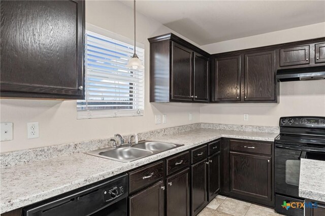 2205 Bald Eagle Ct, Killeen, TX 76549 - kitchen featuring black appliances, under cabinet range hood, light countertops, pendant lighting, and light tile patterned floors