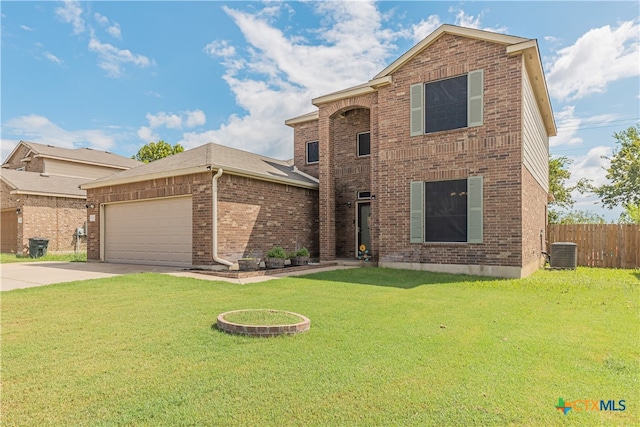 view of front of home featuring central air condition unit, a front lawn, and a garage