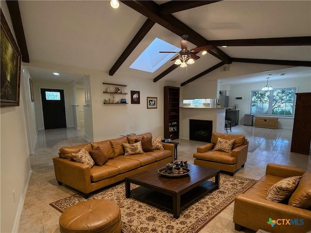 1001 Brookhollow Dr, Port Lavaca, TX 77979 - living area featuring ceiling fan, a fireplace, recessed lighting, and a skylight