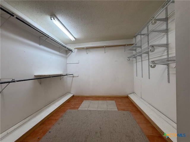 1001 Brookhollow Dr, Port Lavaca, TX 77979 - spacious closet featuring light tile patterned floors